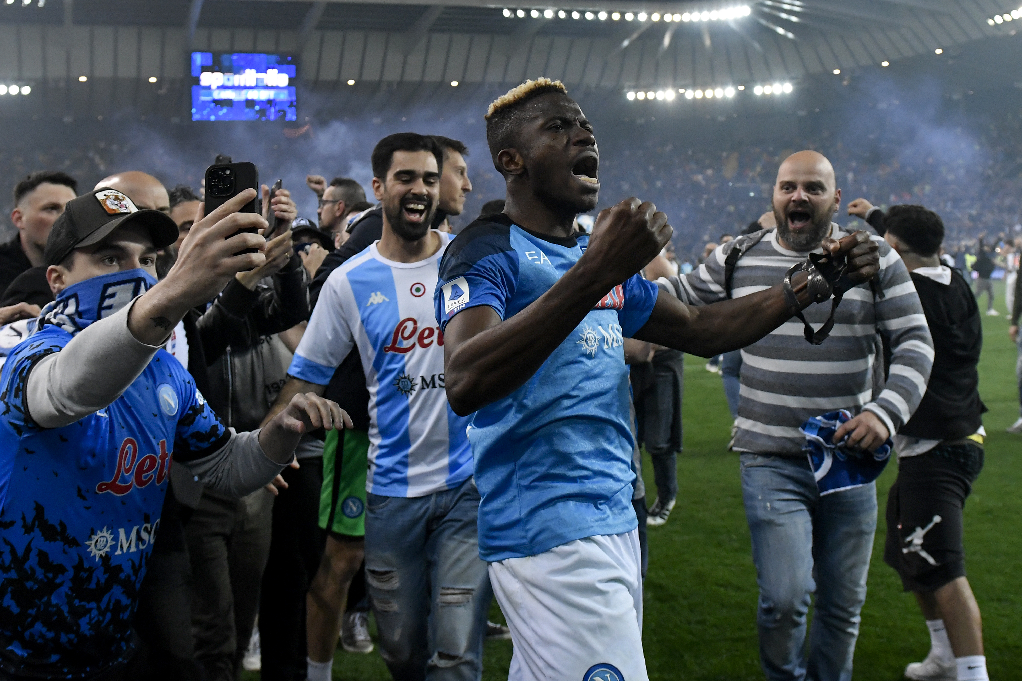 Victor Osimhen of SSC Napoli celebrates with fans at the end of the Serie A football match between Udinese Calcio and SSC Napoli