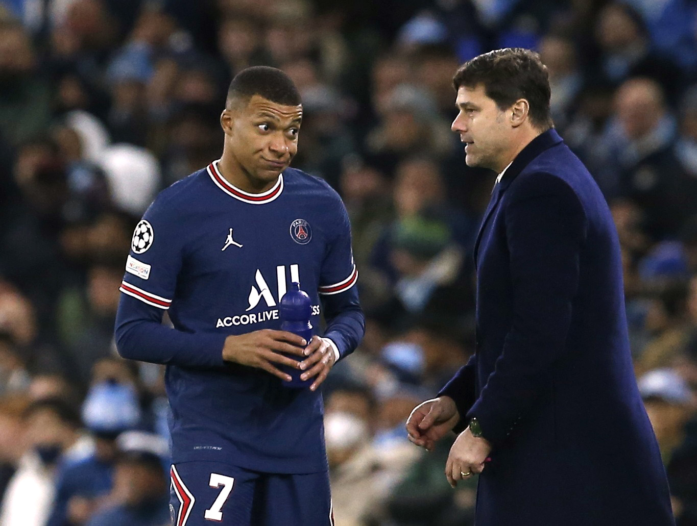 Paris St Germain's Kylian Mbappe with coach Mauricio Pochettino REUTERS/Craig Brough
